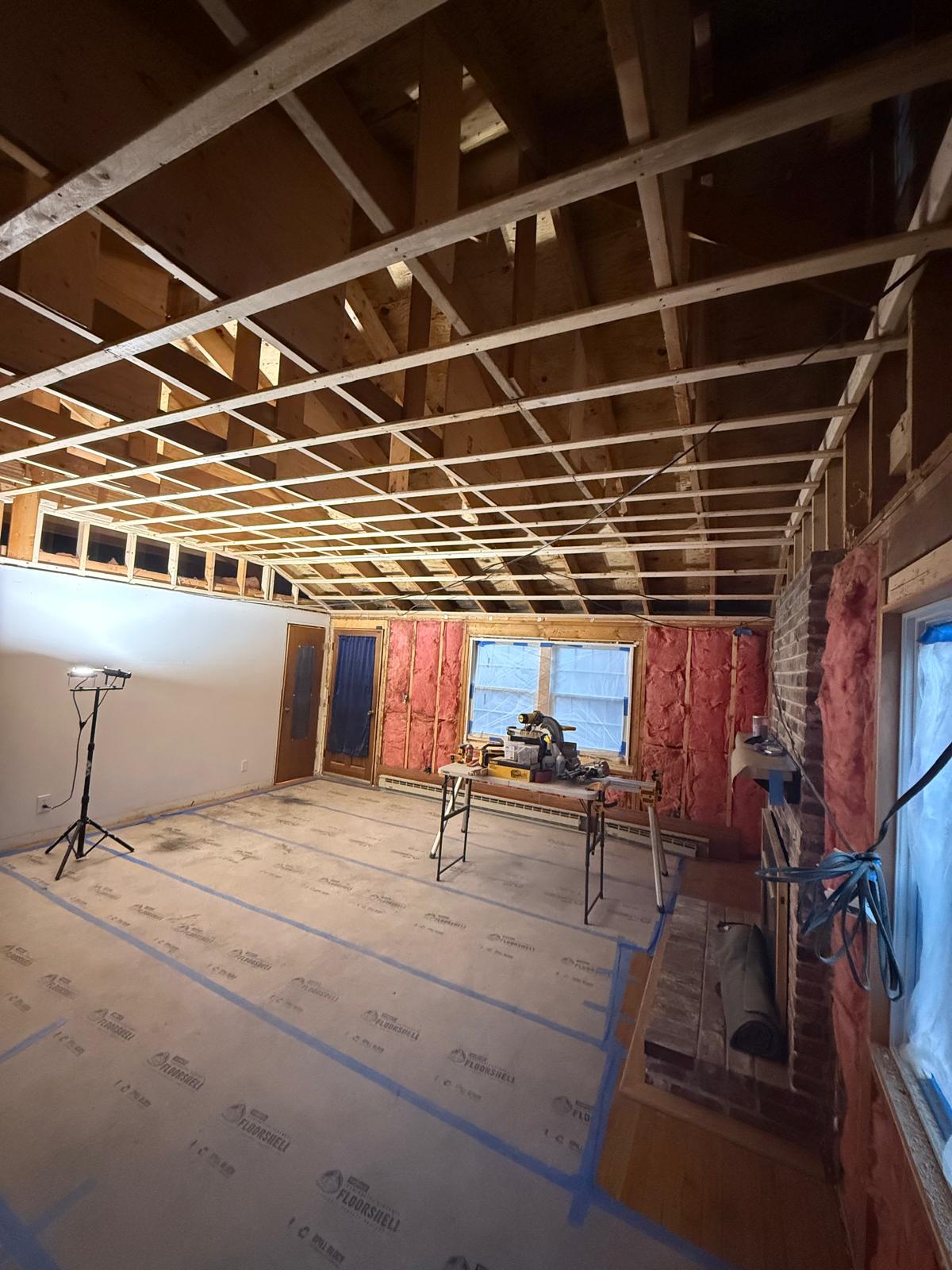 New vaulted ceiling structure with insulation and floor protection